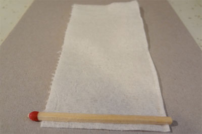 rolling tissue around a match