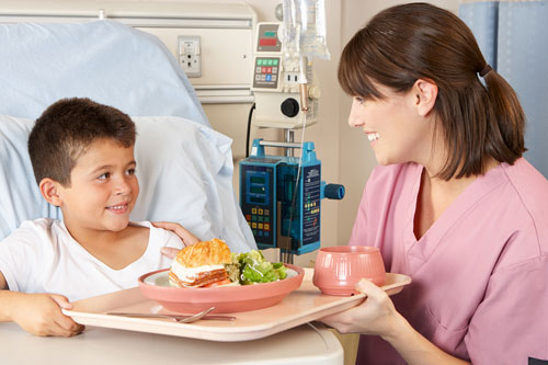 Serving a meal to a patient